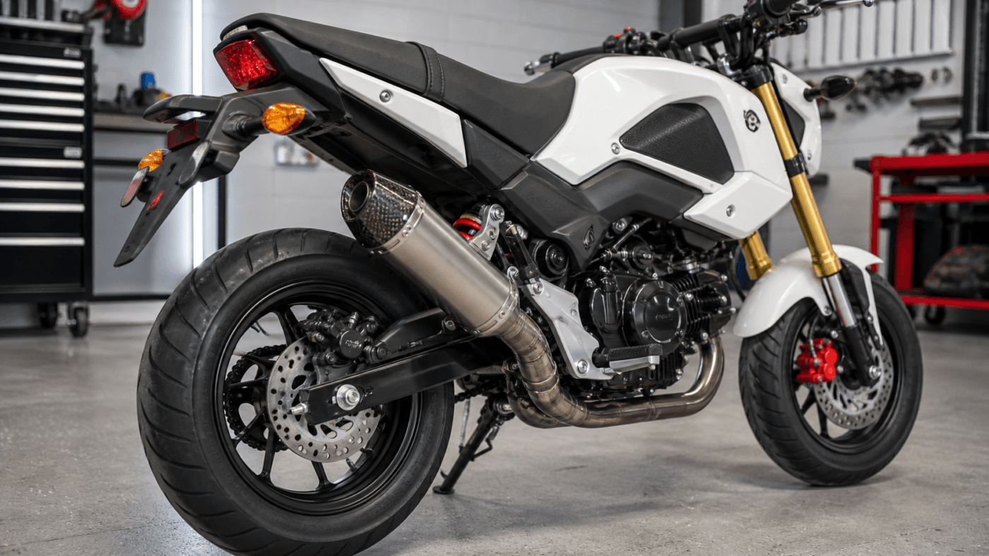 Honda Grom motorcycle with compact aftermarket exhaust system