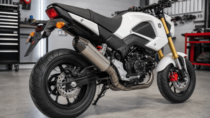 Honda Grom motorcycle with compact aftermarket exhaust system